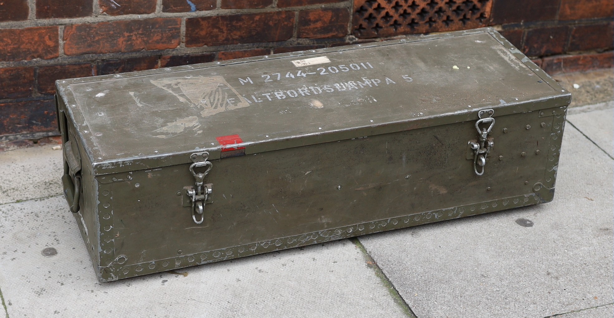 A pair of Swedish Army Carlson Varberg anglepoise lamps with accessories and original instructions dated 1963, in original trunk marked ‘Faltbordslampa 5’, height of lamp to bend 65cm. width of case 83cm